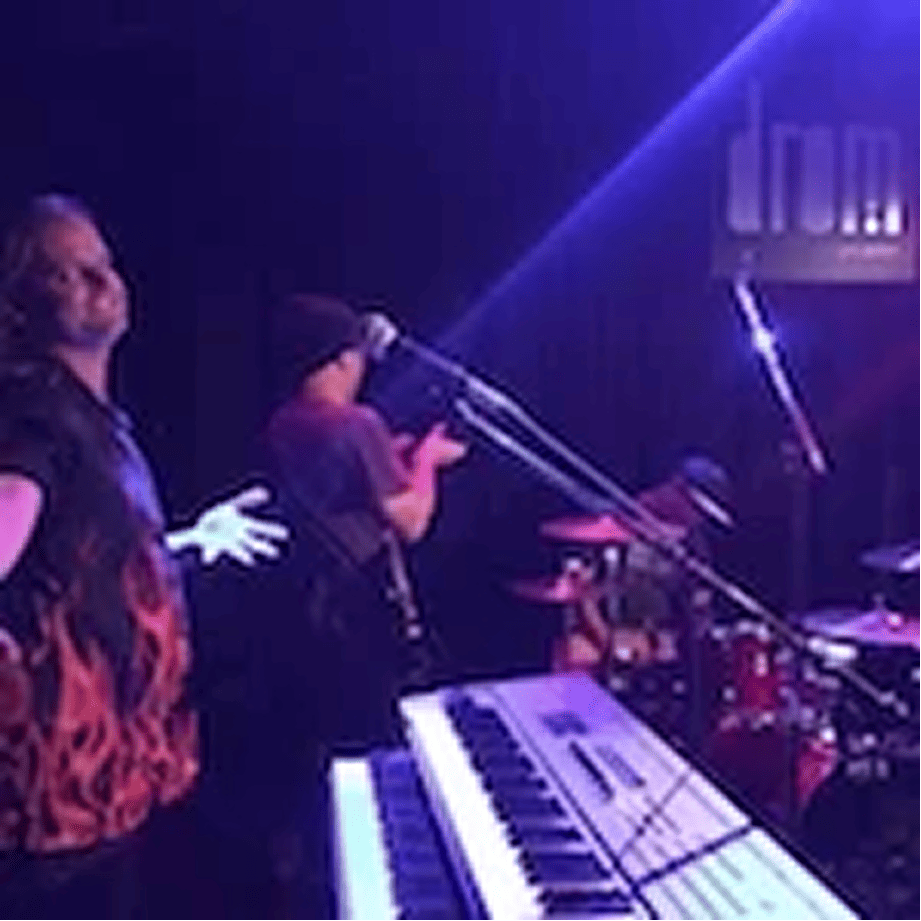 Danny performing as Spike Edney in Queen Forever, bringing the keyboard and auxiliary musical elements essential to Queen’s signature live sound within the Australian tribute show